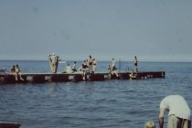 Residents on long concrete pier